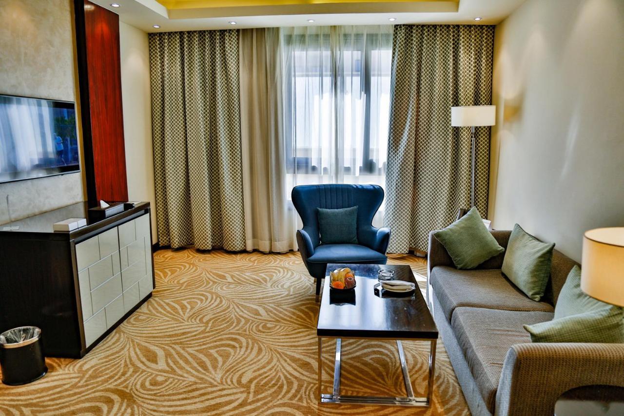 Triumph Luxury Hotel Cairo Exterior photo Living room of a suite
