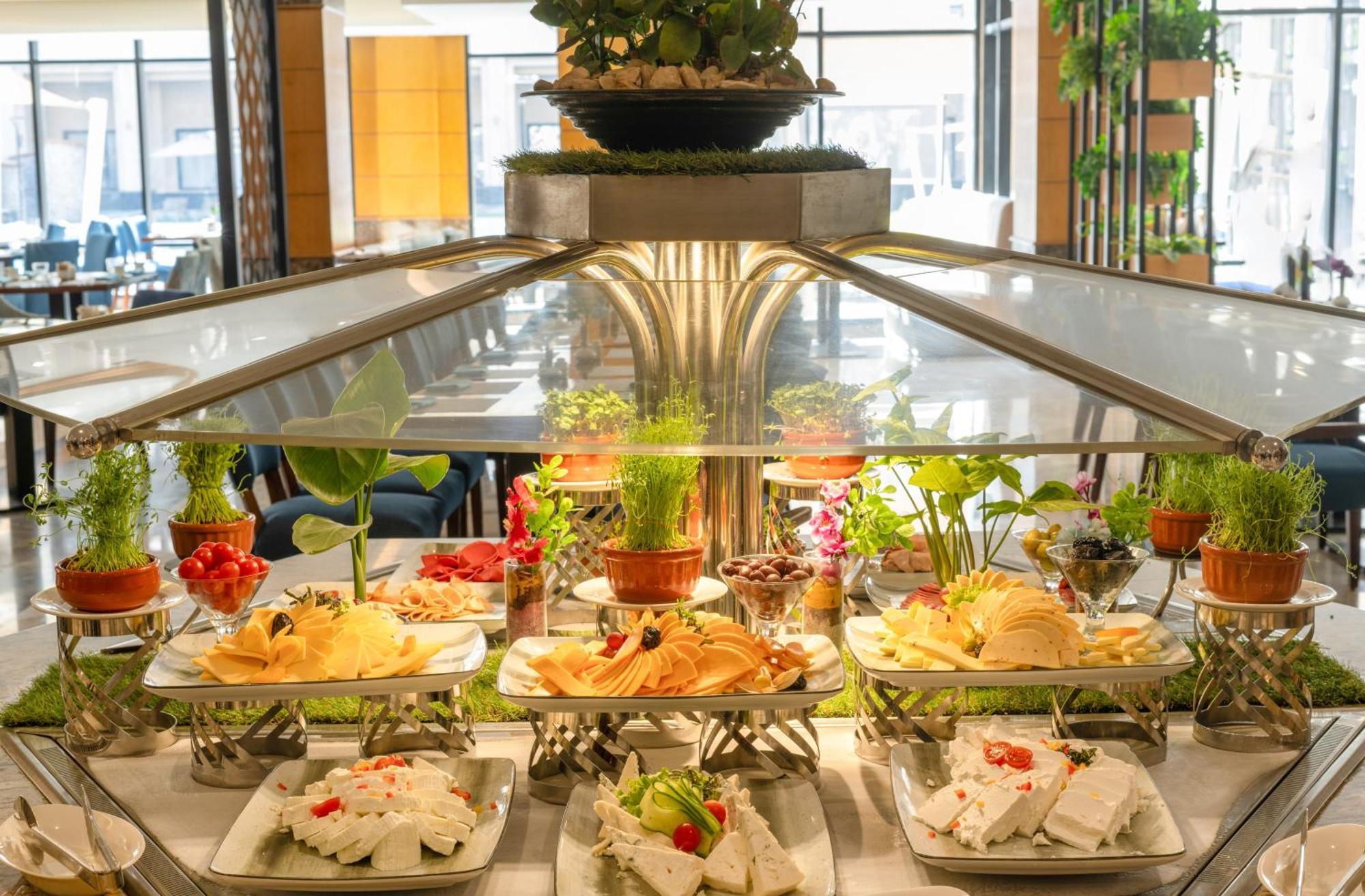 Triumph Luxury Hotel Cairo Exterior photo A cheese display