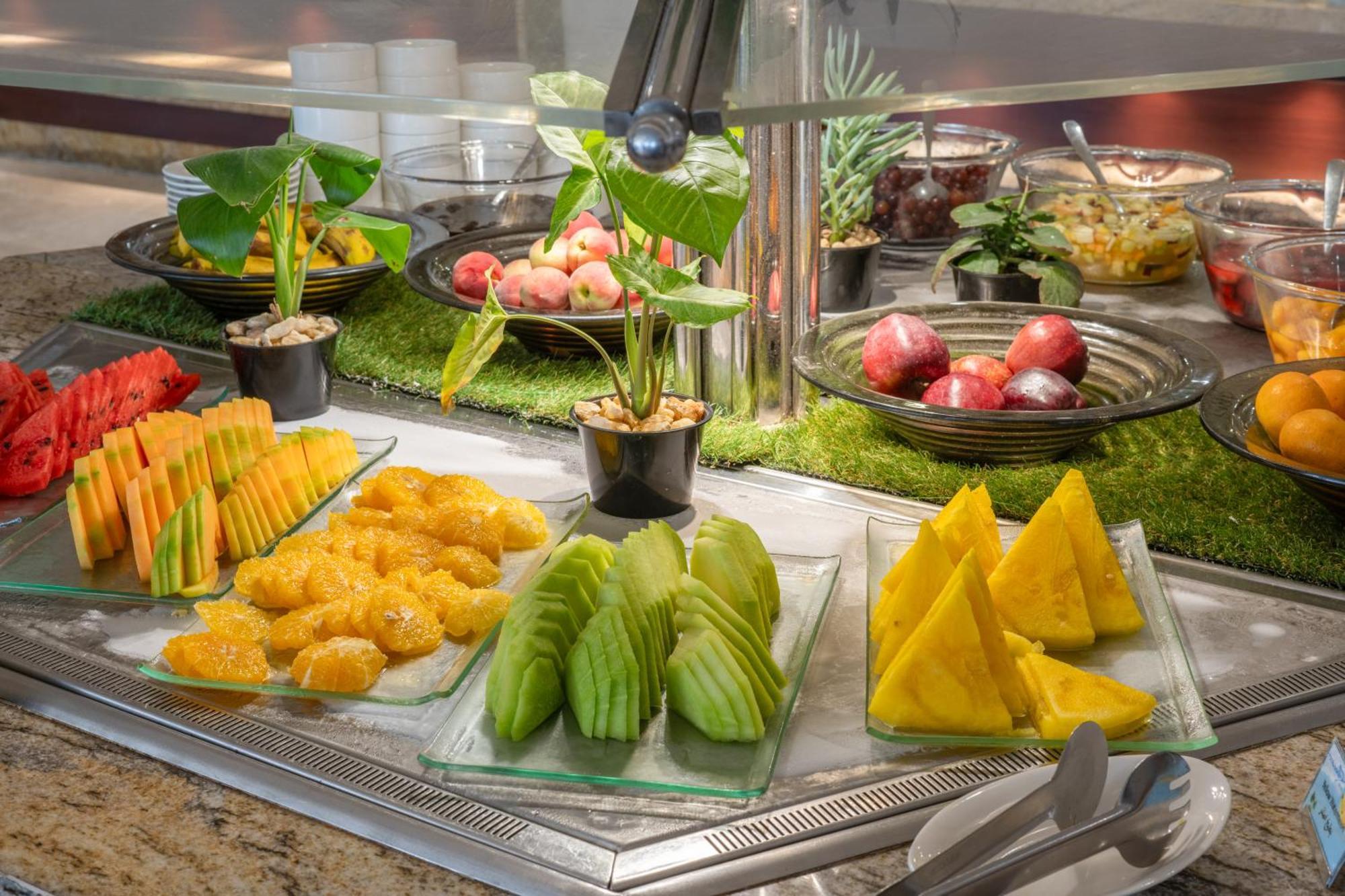 Triumph Luxury Hotel Cairo Exterior photo A fruit salad bar